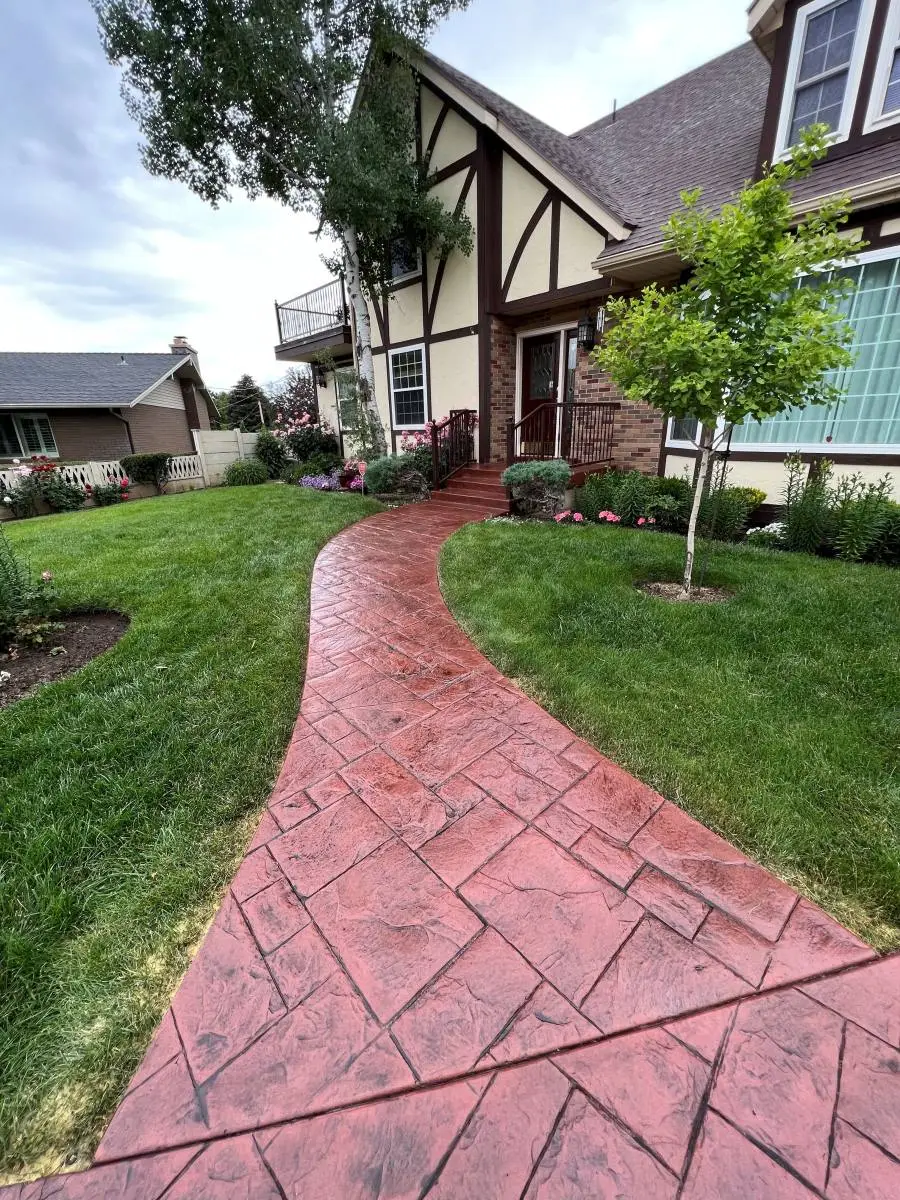 Large stamped concrete area with consistent color hardener coverage