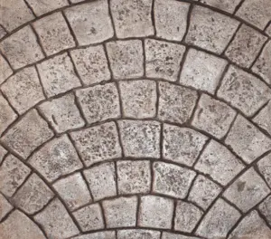 European Fan Small Stone stamped concrete finish — radial fan pattern